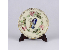 Vajszínű Zsolnay porcelán, aranyozott, kék pillangós tányérka 8.5 cm